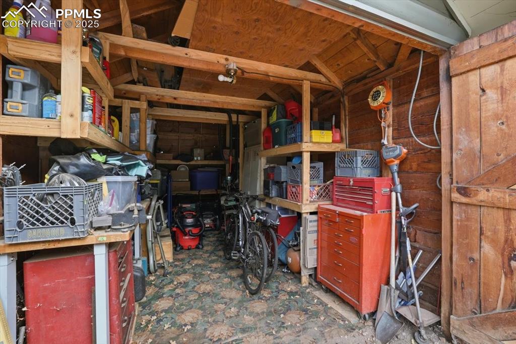 Image 41 of 47: The 18x10 garage is currently in use for storage but there