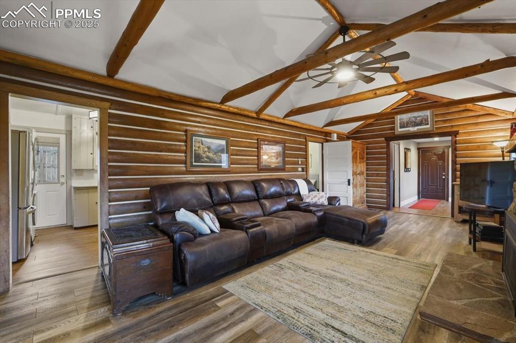 Image 9 of 47: The kitchen is right off the living room and has it