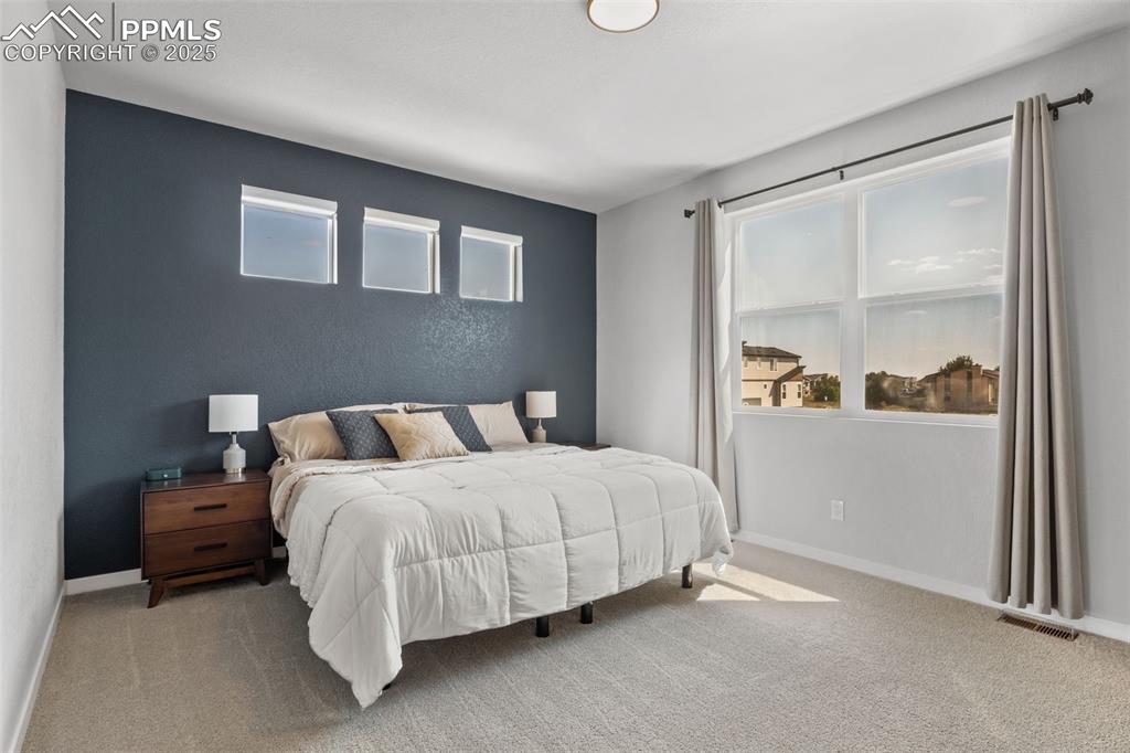 Image 14 of 28: Master Bedroom