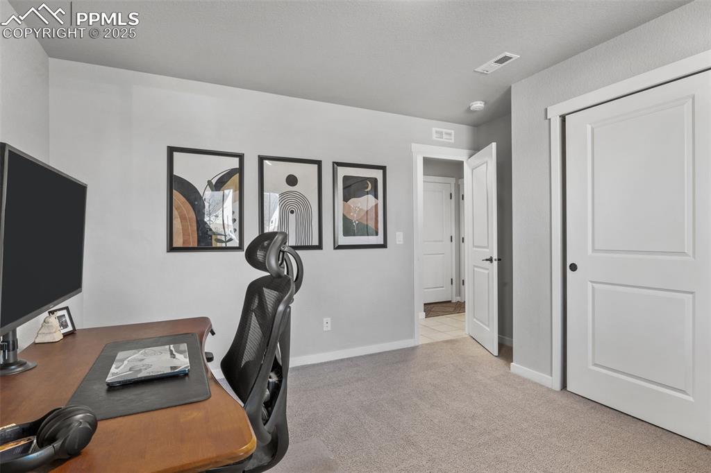 Image 21 of 28: Bedroom