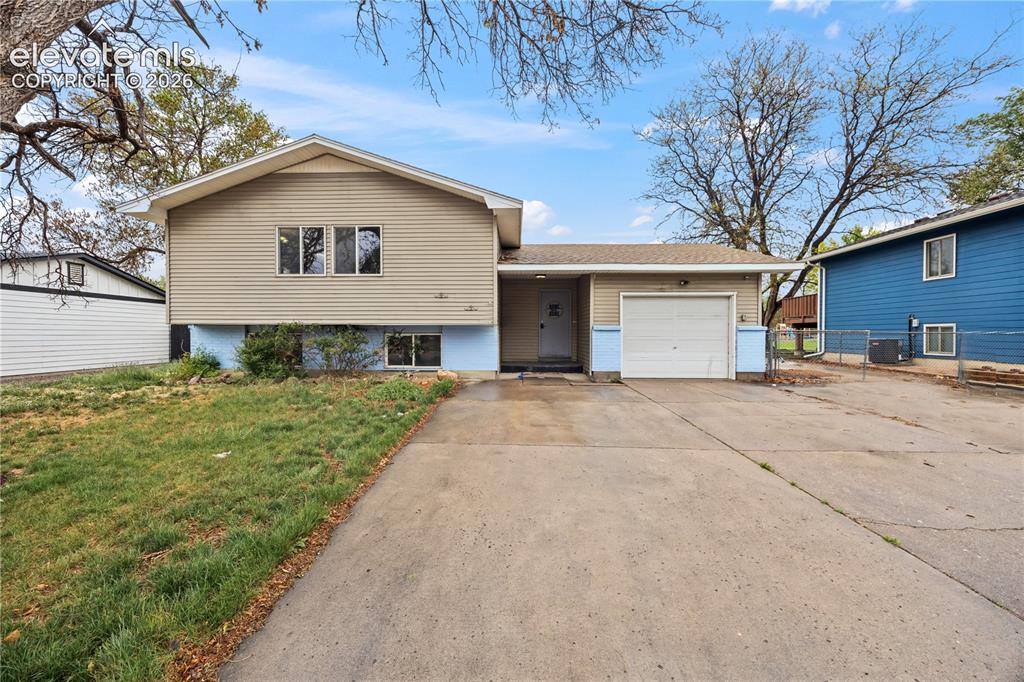 Image 1 of 34: Updated 5 bedroom, 3 bath, tri-level home with 1-car attached garage locate