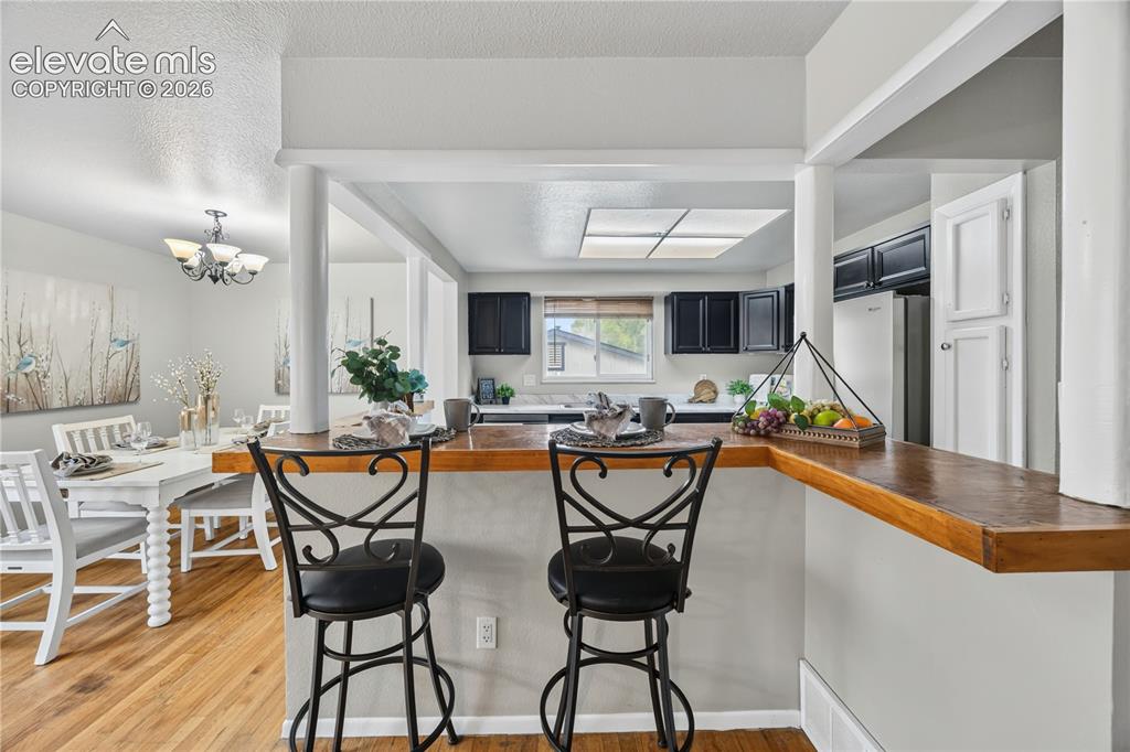 Image 11 of 34: The Upper Level Dining Room is conveniently located off the Kitchen for eas