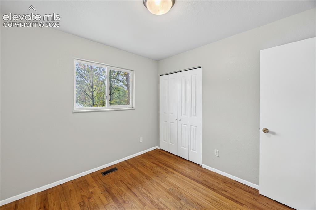 Image 15 of 34: Spacious Upper Level Kitchen with new stainless steel appliance, ample cabi