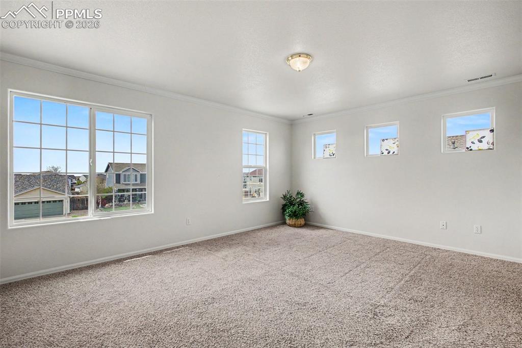 Image 15 of 40: Large, bright master bedroom