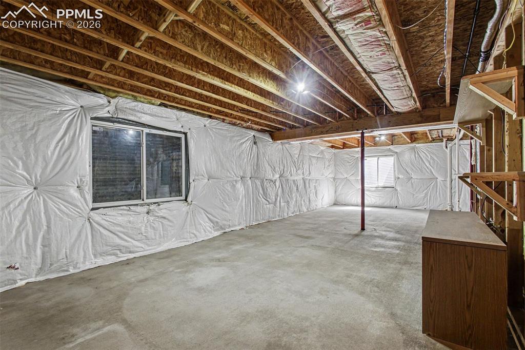 Image 26 of 40: 1,116 square foot pre-plumbed basement ready for your custom expansion!