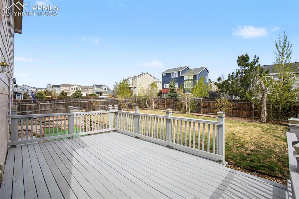 Image 28 of 40: 14x20 composite deck engineered to support a hot tub!