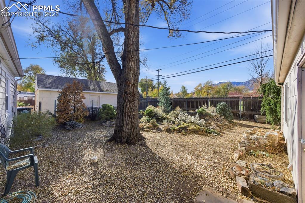 Image 42 of 50: View of fenced backyard