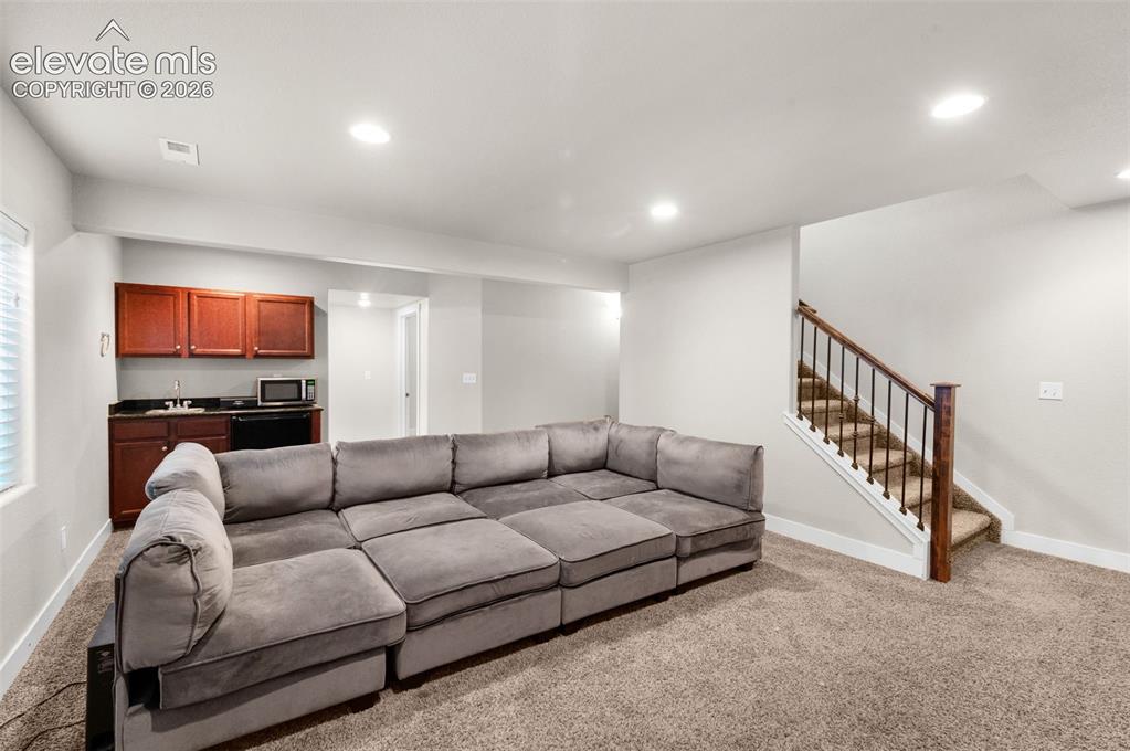 Image 34 of 49: Finished Basement