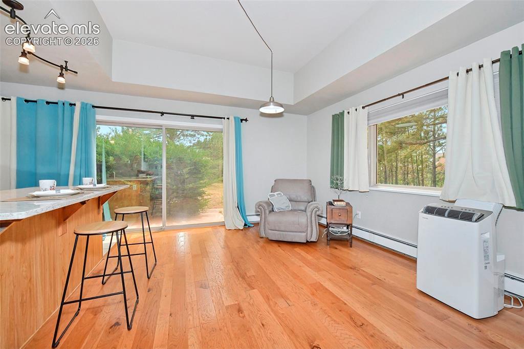 Image 8 of 22: Dining area and sliding door