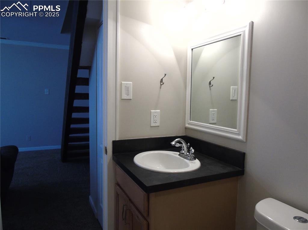 Image 14 of 29: Bathroom featuring vanity and toilet