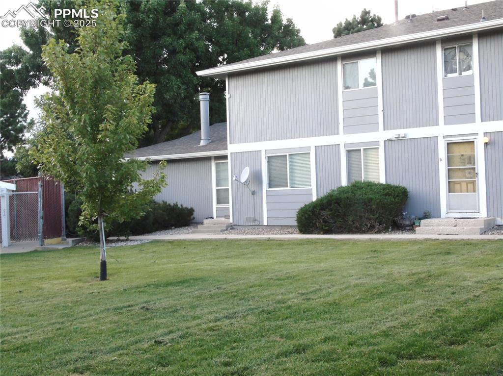 Image 29 of 29: Rear view of property with roof with shingles