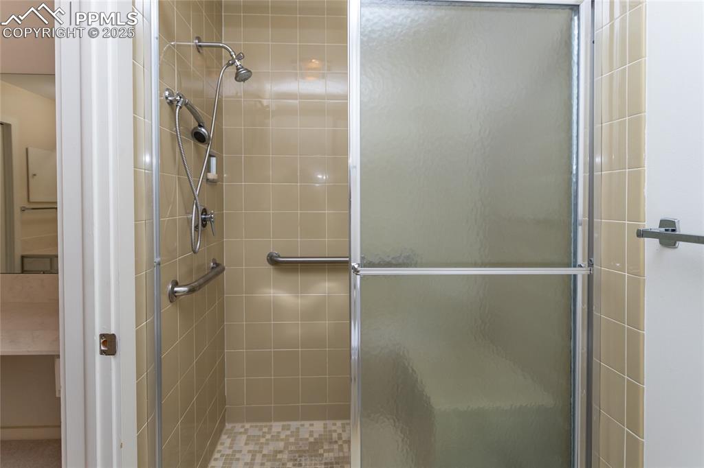 Image 19 of 35: Full bath featuring a shower stall