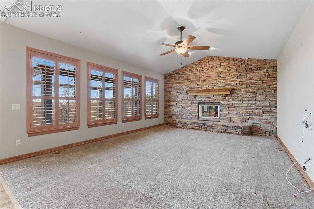Image 15 of 50: Main level family room open to kitchen