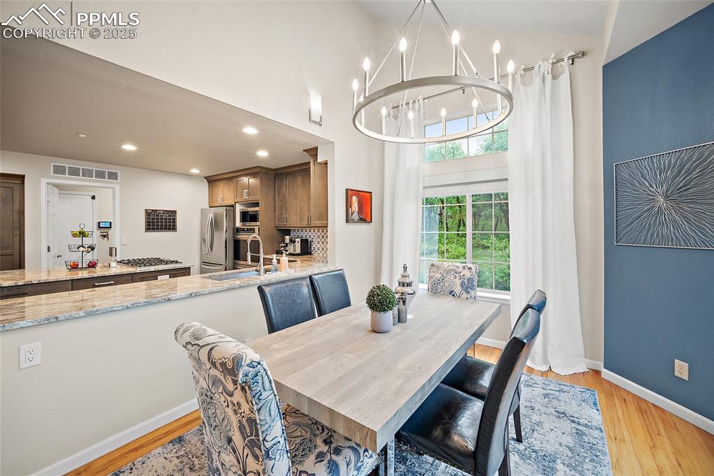 Image 16 of 50: Dining area off of the kitchen 