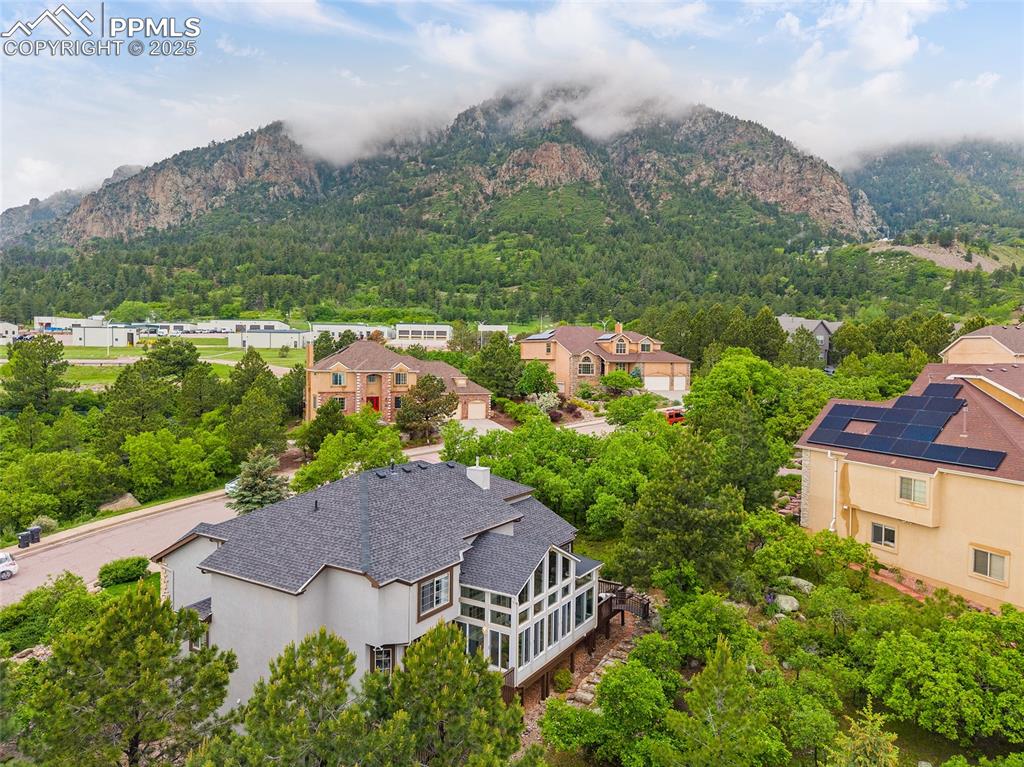 Image 4 of 50: Mountain view featuring a heavily wooded area