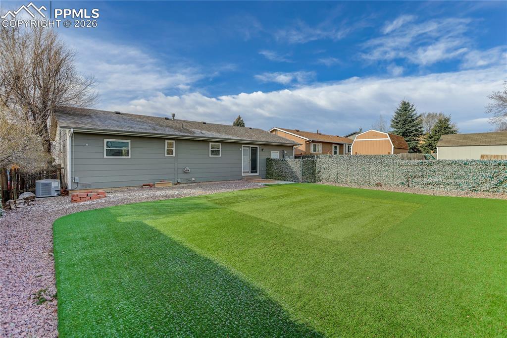 Image 16 of 16: Easy maintenance turf lawn