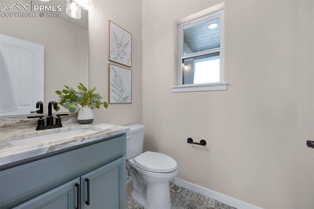 Image 17 of 36: Powder room