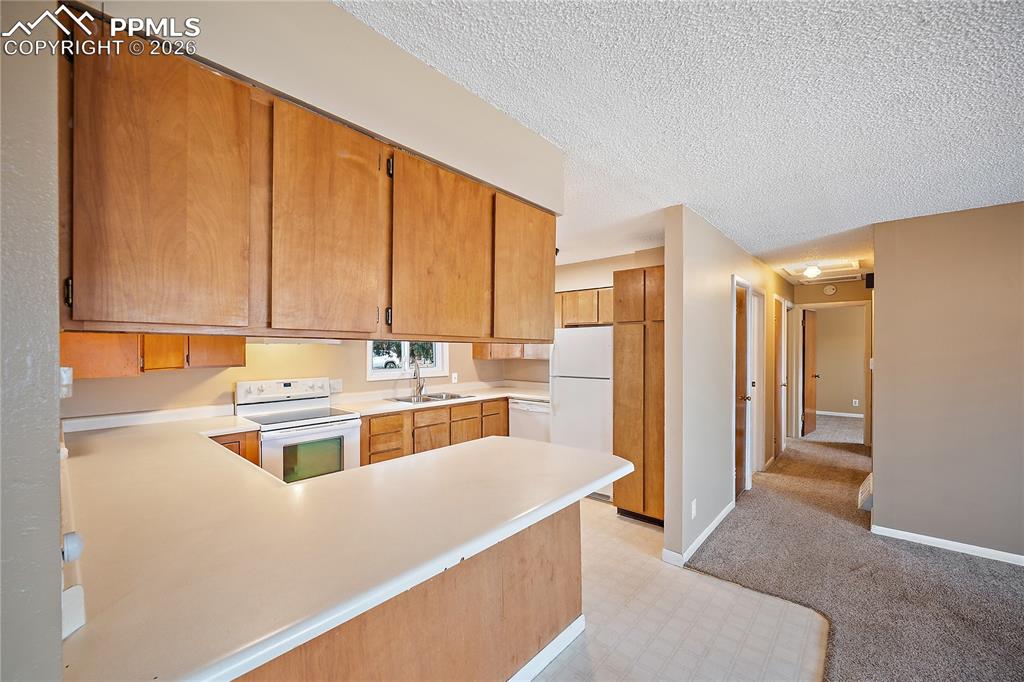 Image 15 of 38: Access to the cabinets from both sides.