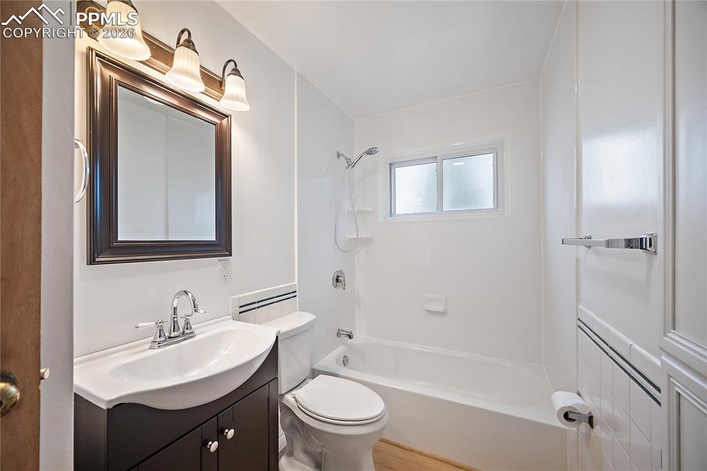 Image 17 of 38: Full bath with new paint