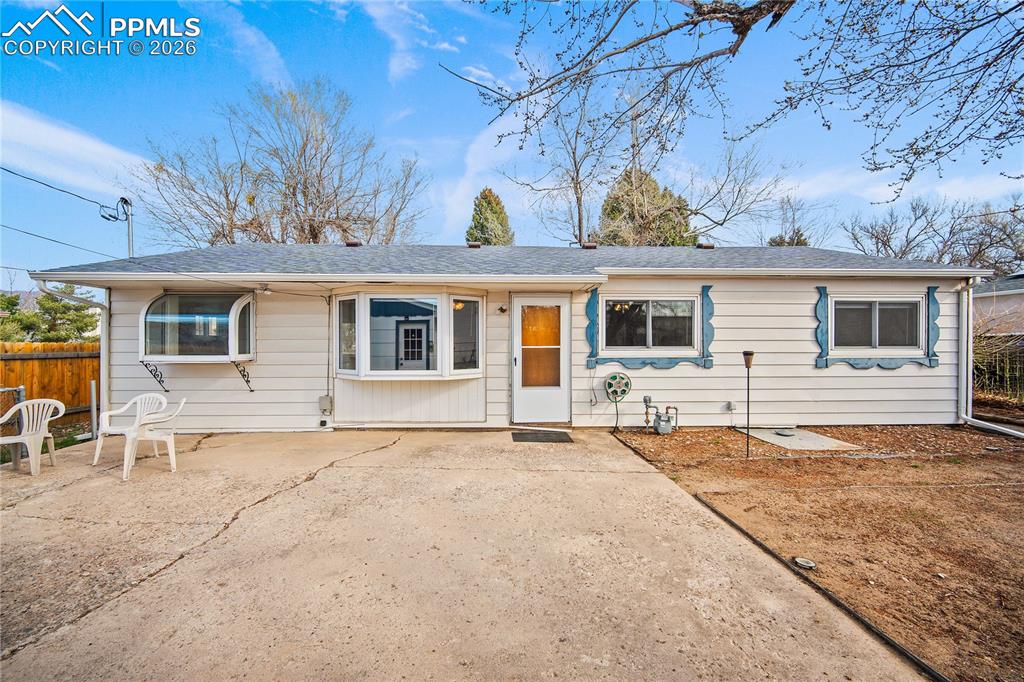 Image 30 of 38: Back of the home.