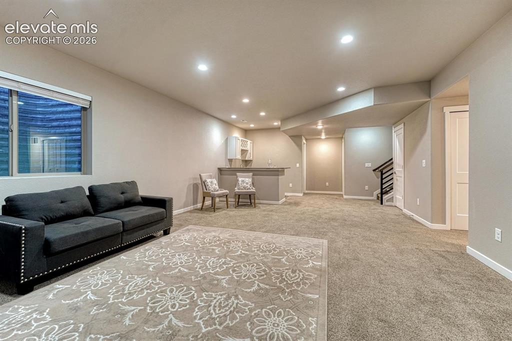 Image 23 of 43: large family room with plenty of space for entertaining