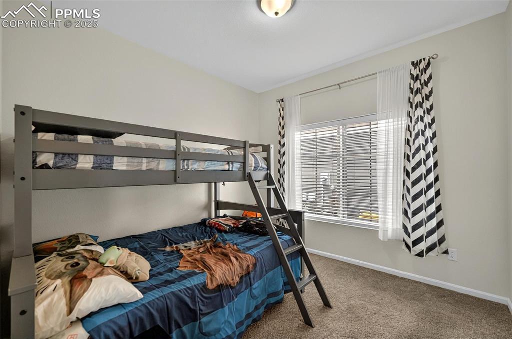 Image 13 of 38: Bedroom
