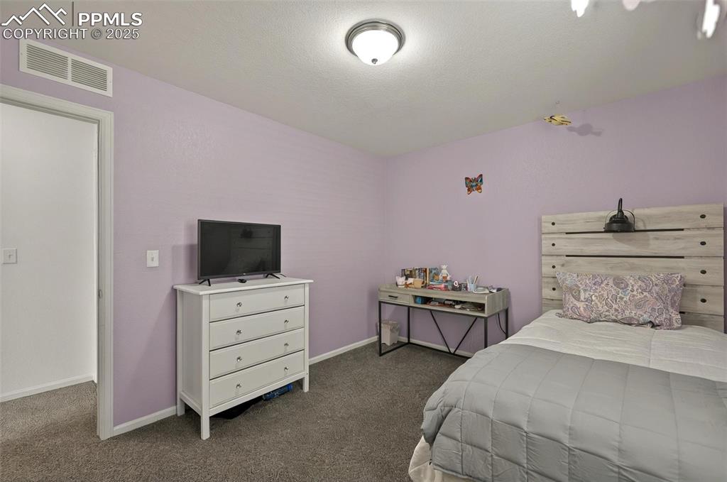 Image 19 of 38: Bedroom