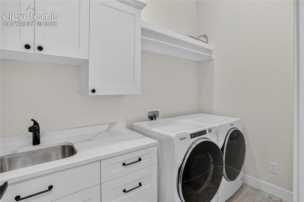 Image 29 of 47: Upper level laundry for Bedrooms 3 & 4
