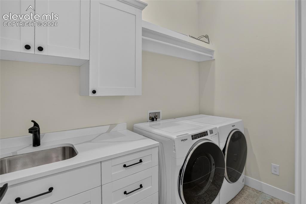 Image 29 of 47: Upper level laundry for Bedrooms 3 & 4