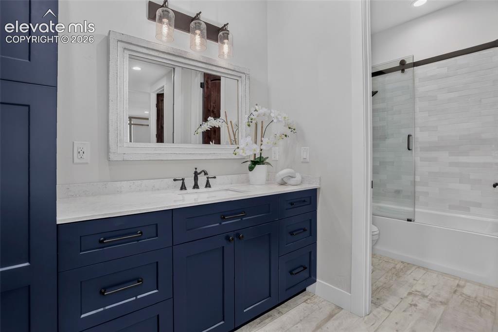 Image 35 of 47: Full guest bath - lower level