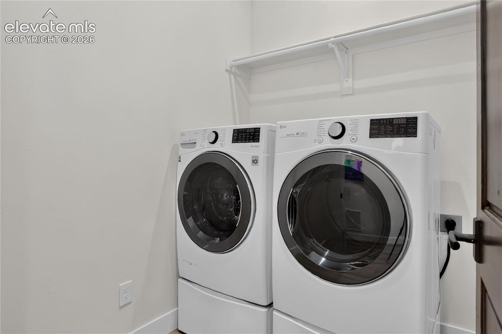 Image 36 of 47: Dedicated laundry room for lower level