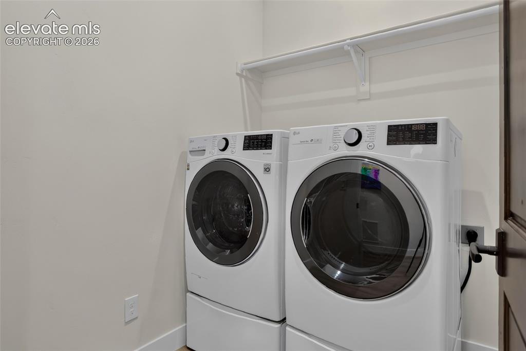 Image 36 of 47: Dedicated laundry room for lower level