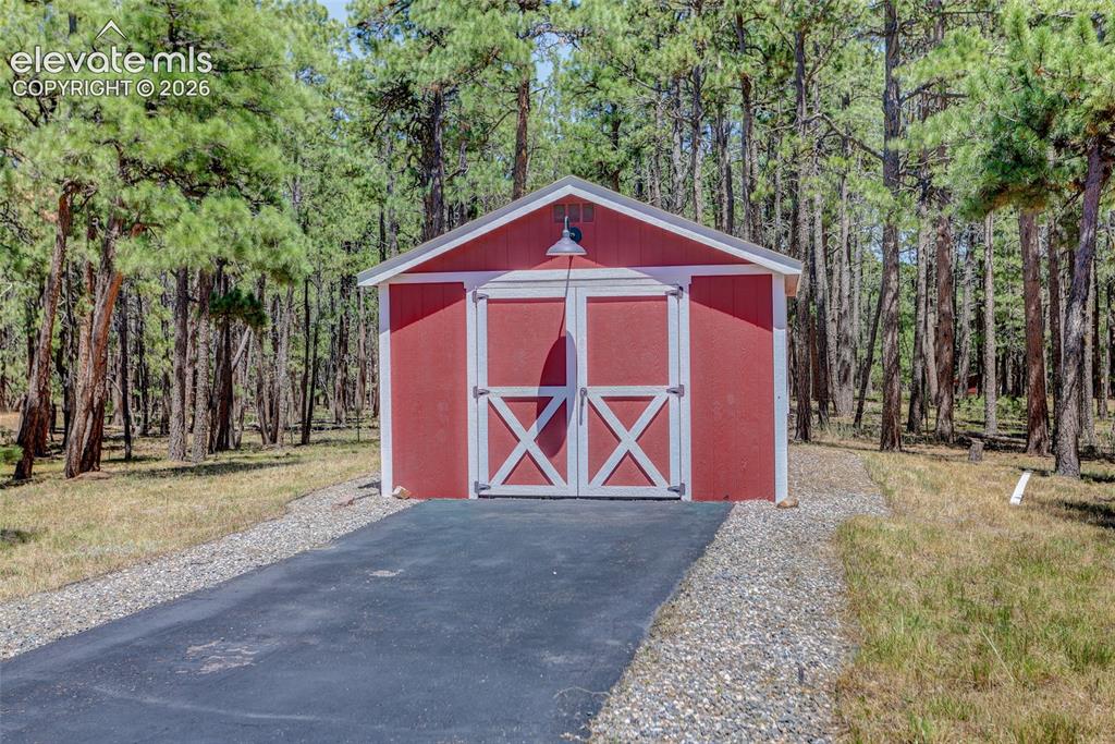 Image 38 of 47: Storage shed