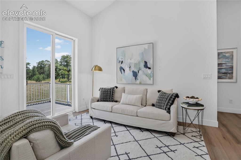 Image 42 of 47: Guest house living room w/ walk-out