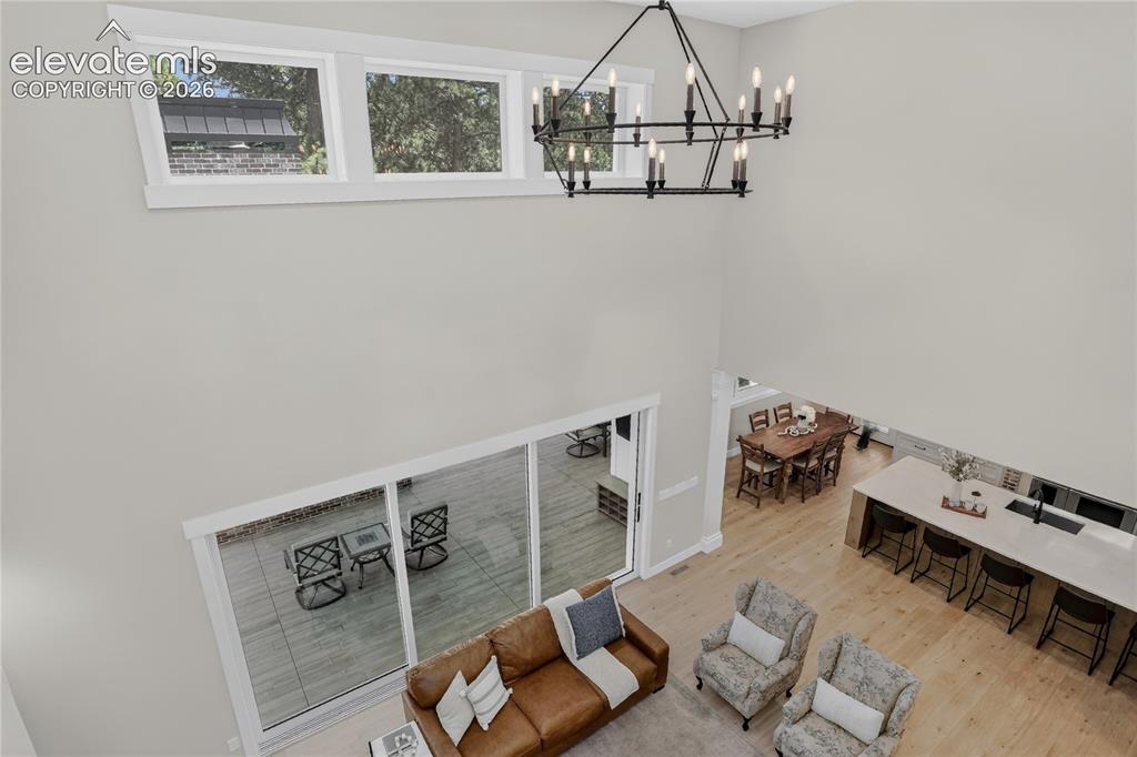 Image 7 of 47: 2-story living room