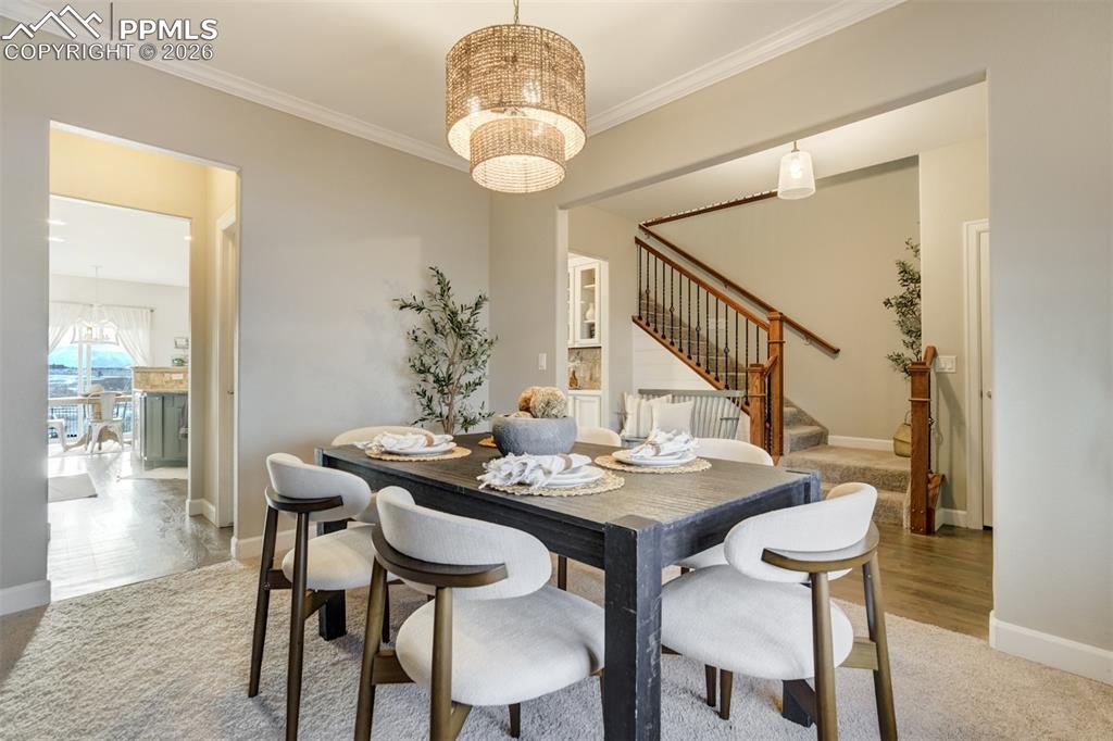 Image 16 of 50: Formal dining room. 