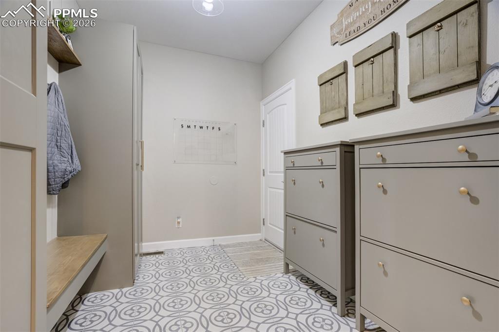 Image 19 of 50: Store all your coats, shoes, sports equipment, and whatever else you need t