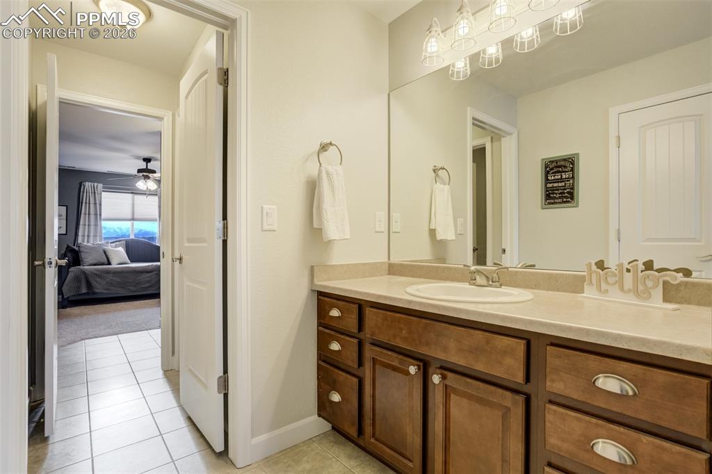 Image 33 of 50: Jack-&-Jill Bathroom with doors separating bedrooms 3 & 4 upstairs.