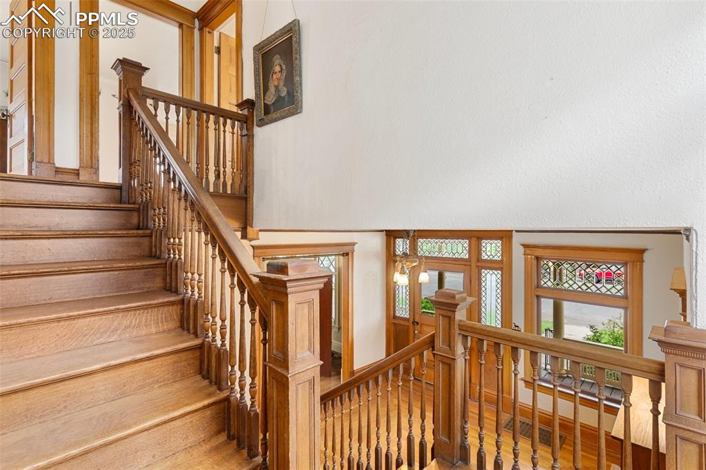 Image 10 of 50: Staircase with a high ceiling