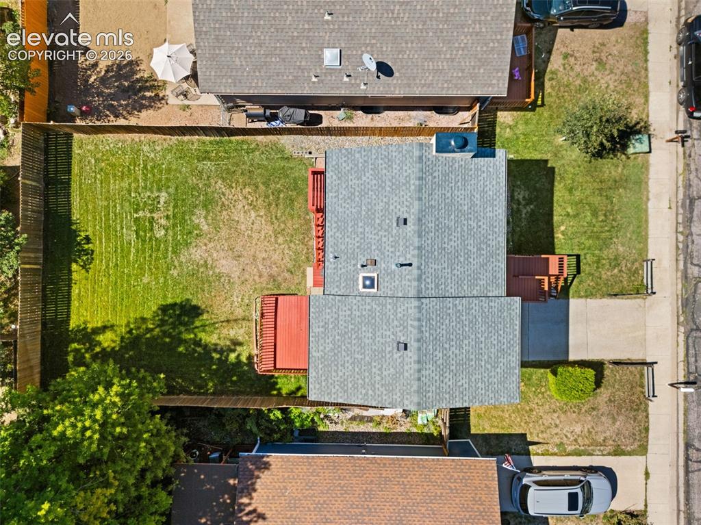 Image 39 of 40: Asphalt shingle roofing with two skylights