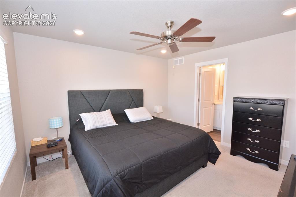 Image 14 of 27: Master Bedroom