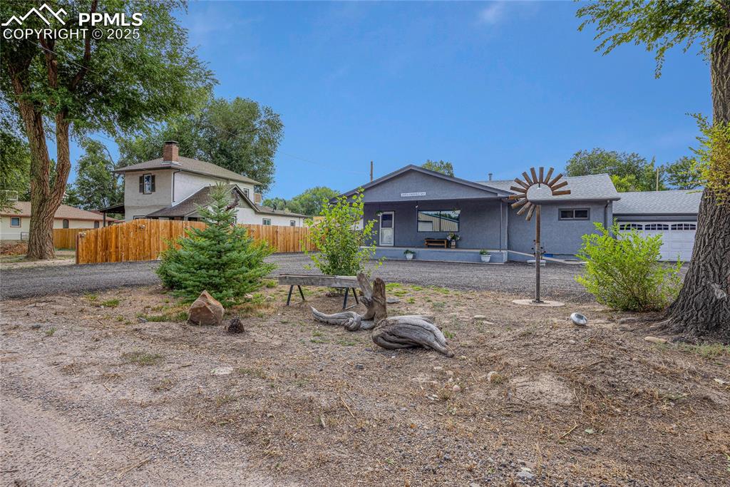 Image 5 of 31: Back of property featuring a patio area