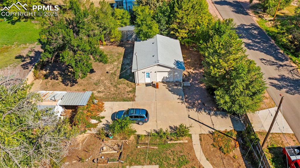 Image 29 of 33: Aerial view of property and surrounding area