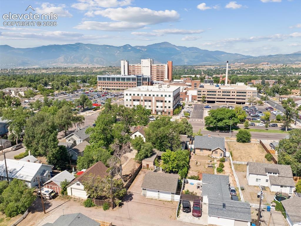 Image 29 of 35: Aerial perspective showcasing a residential area with varied rooflines and