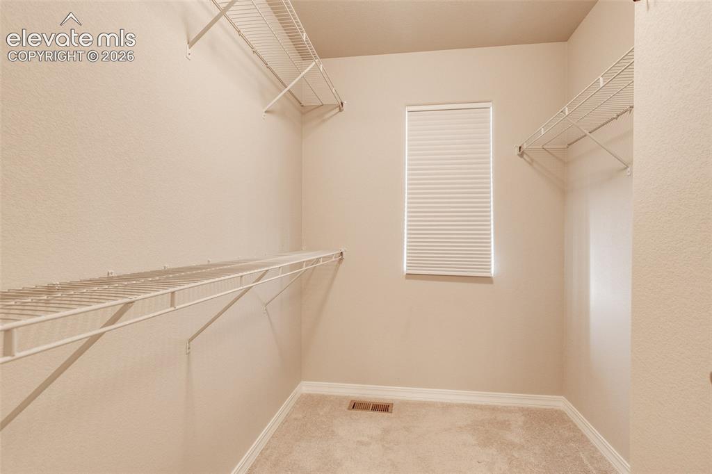 Image 22 of 39: You can get closet envy with this space
