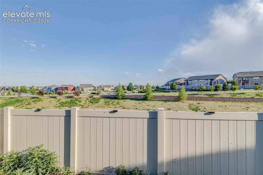 Image 32 of 39: Yard is fully fenced