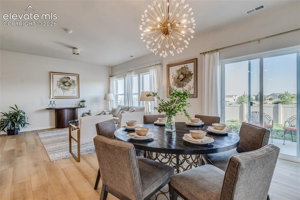 Image 9 of 39: Dining area is a large size where a table of 6 can be placed
