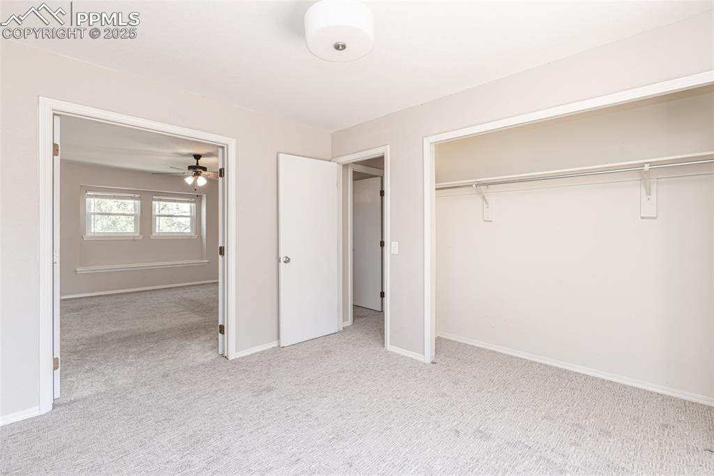 Image 29 of 38: Unfurnished bedroom featuring carpet flooring and a closet