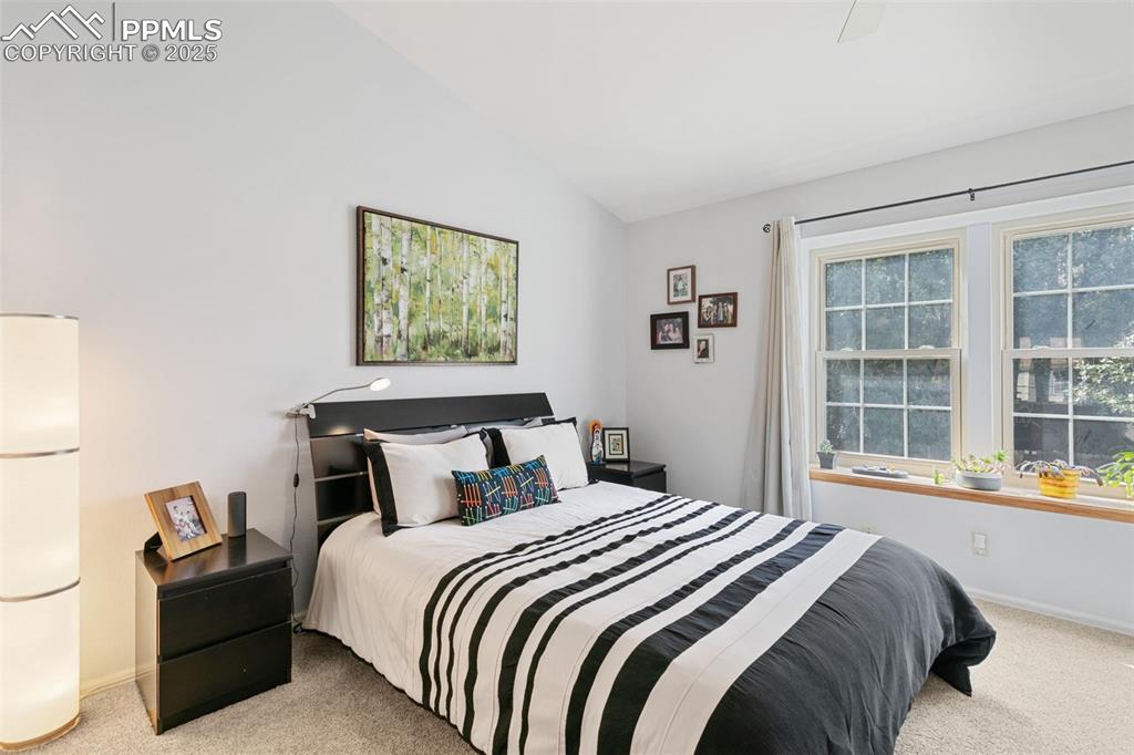 Image 20 of 35: Bedroom 2 upper level with attached 3/4 bath