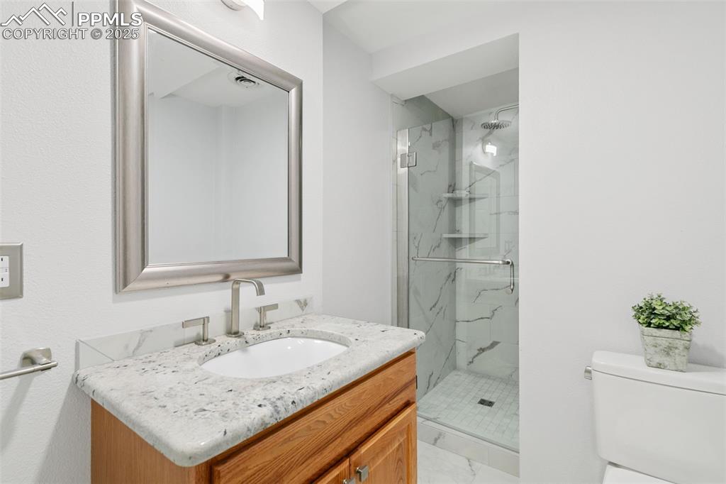 Image 28 of 35: Basement 3/4 bath